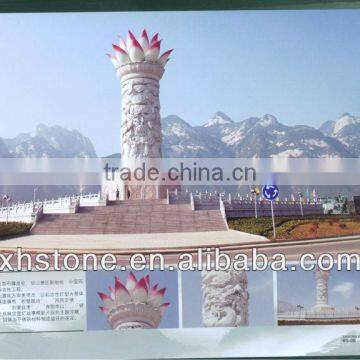 big round stone column with dragon carvings