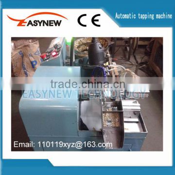 Automatic nut tapping equipment