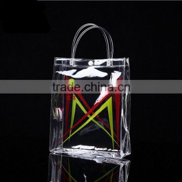 clear PVC bag,button closure style shopping bag ,gift bag ,Cosmetic bag ,with PVC pipe handle and customized printing