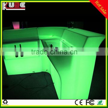 illuminated LED bar counter design used in cafe shop