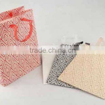 Colorful Shopping Paper Bag Through Foaming Process/Printed Foldable Gift Bag photo-2