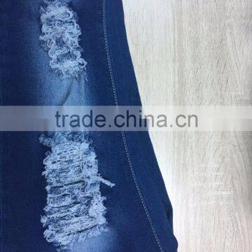 GZY Slim and Ripped Hole Women Jeans Leather Label Stock High Quality Wholesale China 2017 photo-3