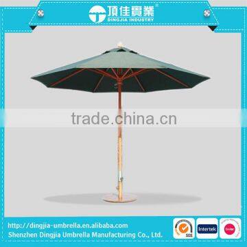 wooden pole beach umbrella