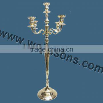 Hot gold candelabra and centerpieces for wedding manufactured by Royal De Wajidsons