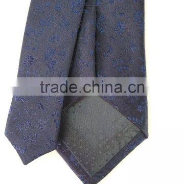 Men's blue/navy 100% silk tie with leaves design