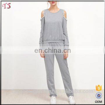 Guangzhou clothing sports wear cold shoulder latest design plain tracksuit women