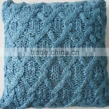 Blue knitted cushion