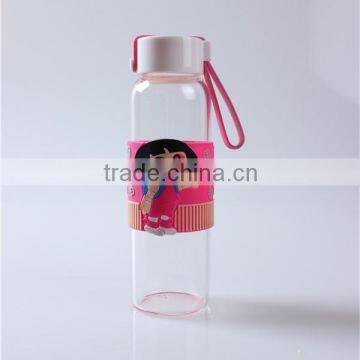 new style wholesale sports tea glass water bottle with cartoon silicone sleeve