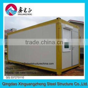 Flatpack container equipment house with single door and slide window