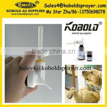 Spray head attached to medicine bottle for animals care