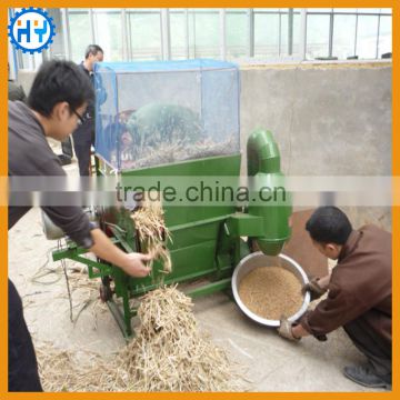 Low breaking wheat soybean thresher