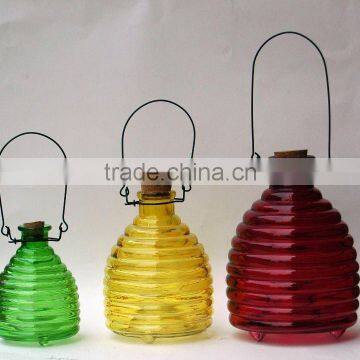 different colored glass wasp traps as pest control