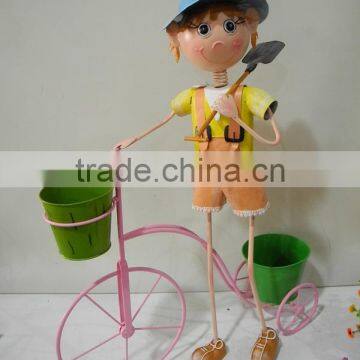 Best selling iron boy with bicycle for garden decoration