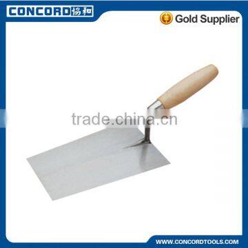 German pattern bricklaying trowel with wooden handle, carbon steel blade