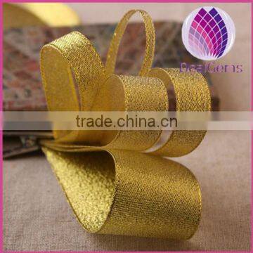 Ribbon,satin,gold, 4/5inch wide . Pkg of 22.5-meter roll.