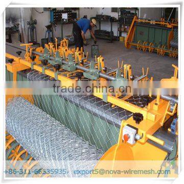 Chain link fence making machine