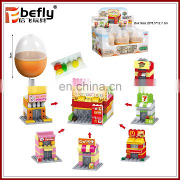 Wholesale plastic egg container candy toy with block