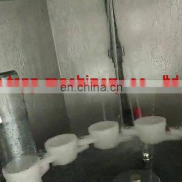 Semi automatic rotary bottle washing machine with low water consumption