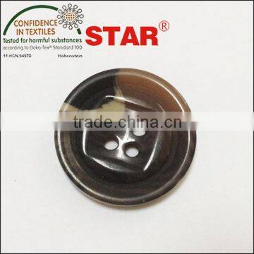 brown plastic coat buttons