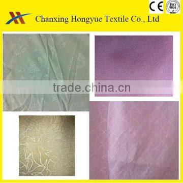 Woven Microfiber Polyster brushed dyed textile fabric/Soft peach skin polyester embossed bed sheet fabric