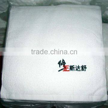 white hand towel tablets