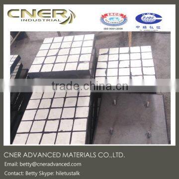 Ceramic rubber composite wear liner with steel backing plate