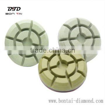 Resin bond diamond polishing pads for concrete and terrazzo