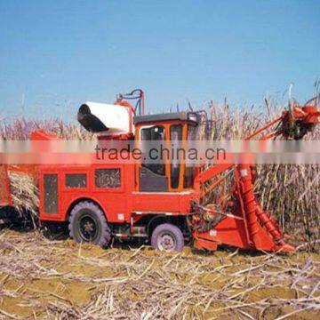 Whole stalk sugarcane combine harvester