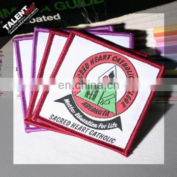 custom Laser cut overlocking bordure shaped woven badge for uniform garment