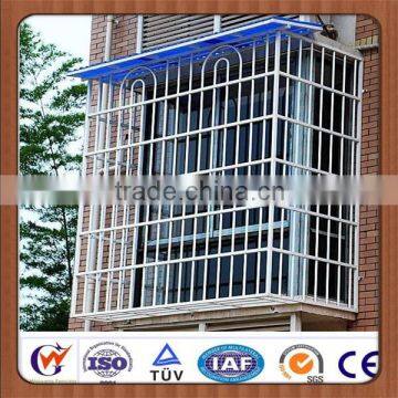 Wrought iron and galvanized steel window grill design