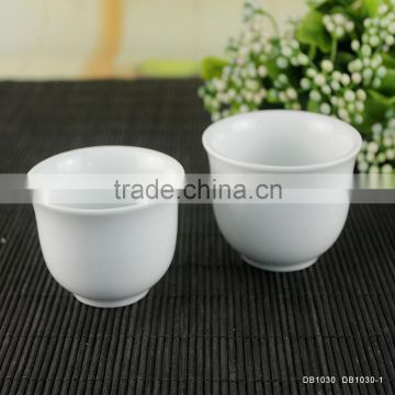 white porcelain tea cup without handle and lids