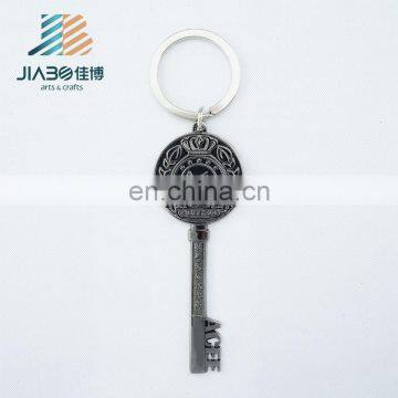 Promotional custom made engraved logo key shape metal key chain