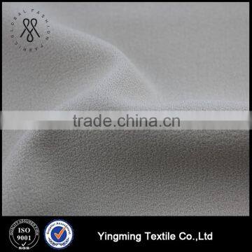 China Good Price 95% Polyester 5% Spandex Composite Weft Elastic Crepe Fabric for Women's Clothes/Dresses