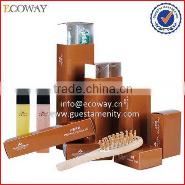 Luxury hotel guest amenities sample in gold cardbox