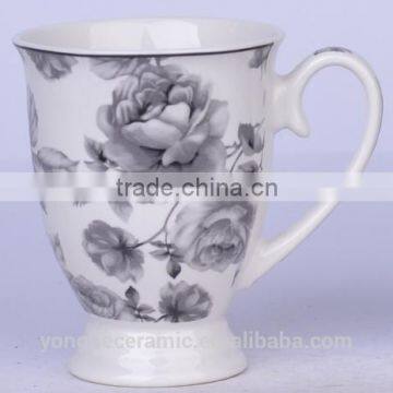 Black and white coffee mugs with foot