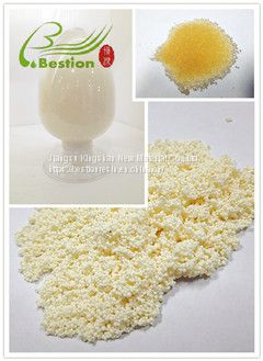 Citrus juice debittering resin