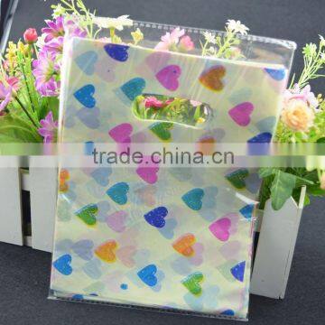 custom design colorful flat packing competitive price die cut plastic bag , heart shape shopping bag