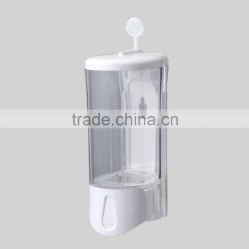 Clear plastic box of commercial liquid hand soap dispenser