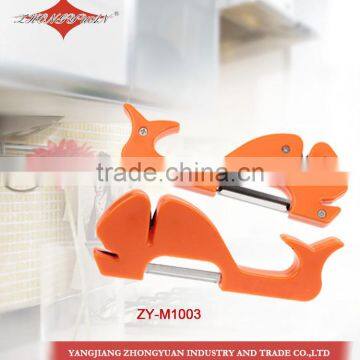 Whale shaped knife sharpener with plastic grip