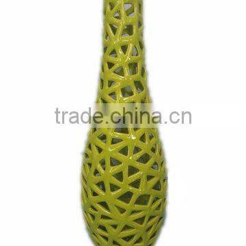 Ceramic pierced vase in green