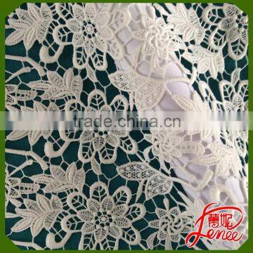 ELEGANT WHITE CHEMICAL EMBROIDERY FABRIC FOR GARMNET