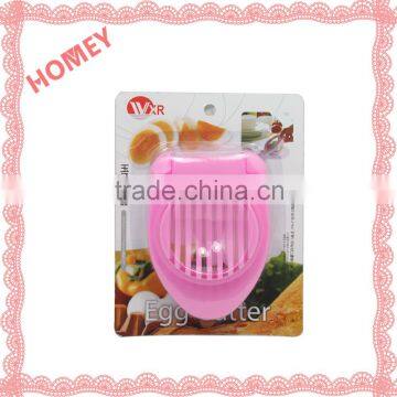 Plastic Egg Cutter with Piercer keeps the egg from rolling off