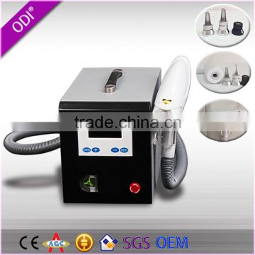 Mini yag laser tattoo machine with 1064nm , 532nm and black doll tips