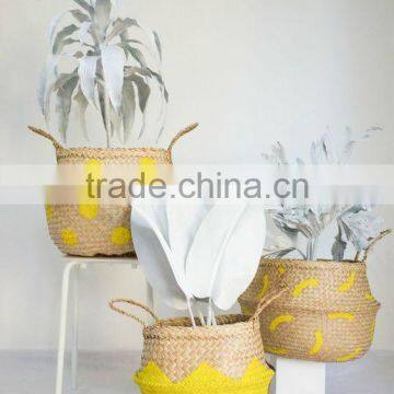 Seagrass belly basket with handpainted star decoration
