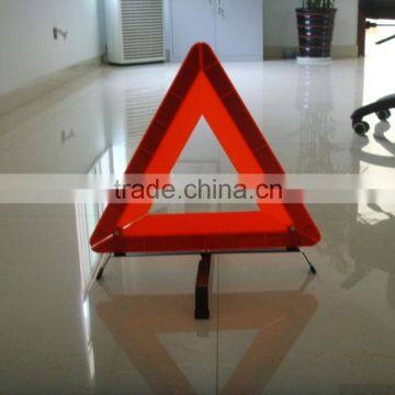 red reflective traffic warning triangle