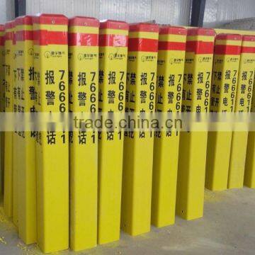 Fiberglass warning pile used in cable lines