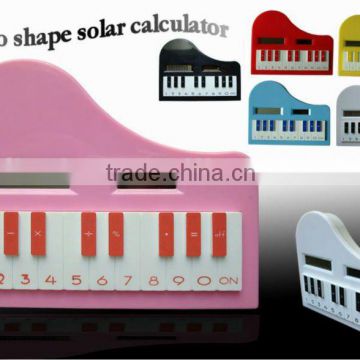 8 digital Piano shaped solar calculator