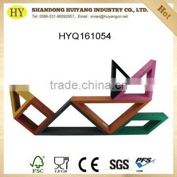Tangram Shape Wooden Display Rack Against Wall photo-4