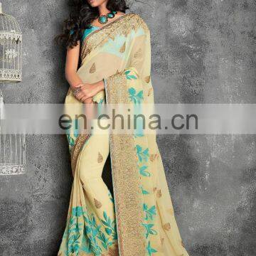 Cream colored pure chiffon saree.