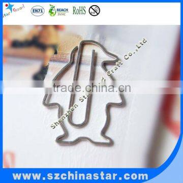 Metal penguin shaped paper clip as school supplies